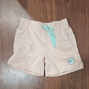 Nike Kids Tan Shorts with Teal Accent